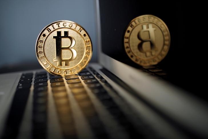 2017-09-28T070933Z_2_LYNXNPED8R079_RTROPTP_3_CHINA-FINANCE-DIGITAL-ICO.JPG