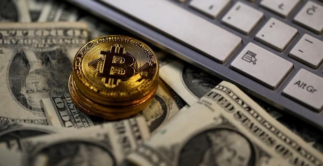 2017-11-28T060855Z_1_LYNXMPEDAR0AM_RTROPTP_3_BLOCKCHAIN-REGULATION-TOKENS.jpg