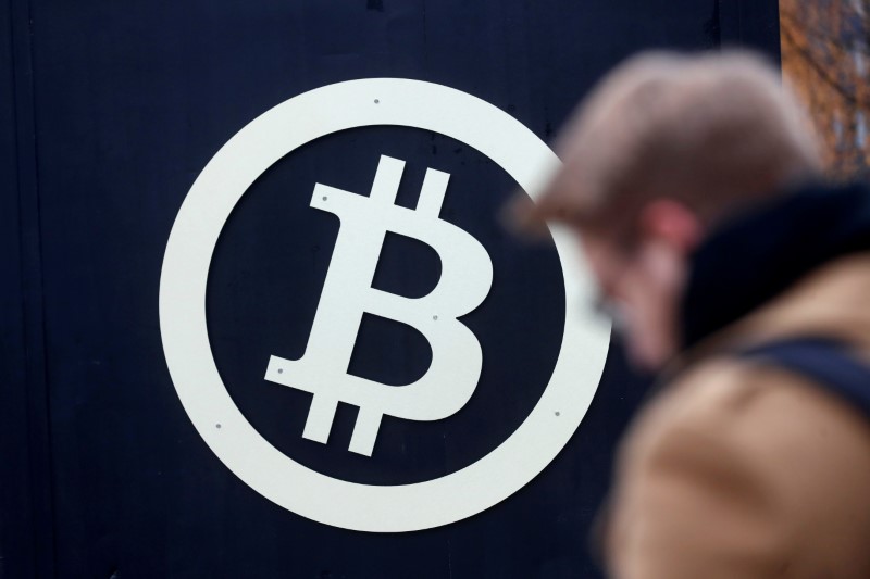 2017-12-03T035750Z_1_LYNXMPEDB203P_RTROPTP_3_BLOCKCHAIN-REGULATION-TOKENS.JPG