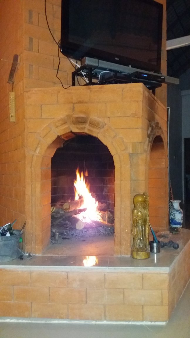 Our Fireplace with Lao Tzu getting a heat on..jpg