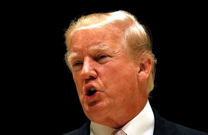 2018-01-15T010713Z_1_LYNXMPEE0E01Q_RTROPTP_4_USA-TRUMP.JPG