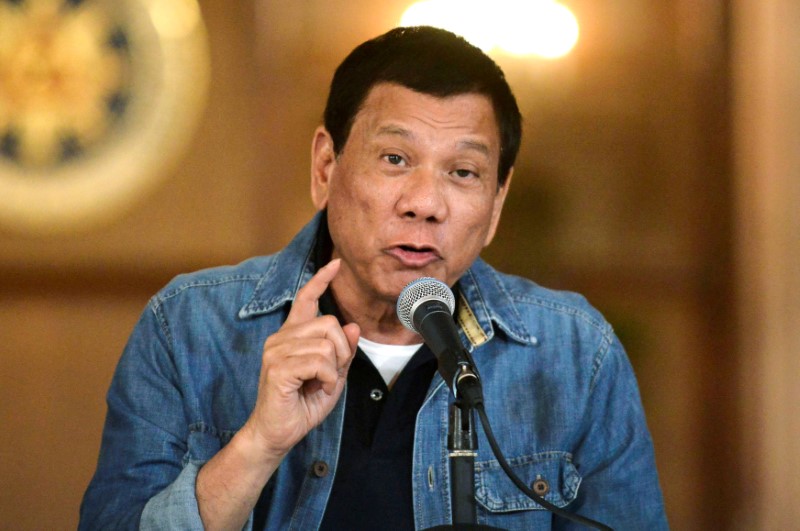 2018-03-15T065703Z_1_LYNXNPEE2E0E2_RTROPTP_3_PHILIPPINES-DUTERTE-ICC.JPG