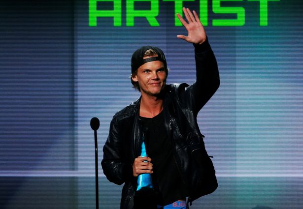 FILE-PHOTO-Avicii-accepts-the-favorite-electronic-dance-music-artist-award-at-the-41st-American-Mus1.jpg