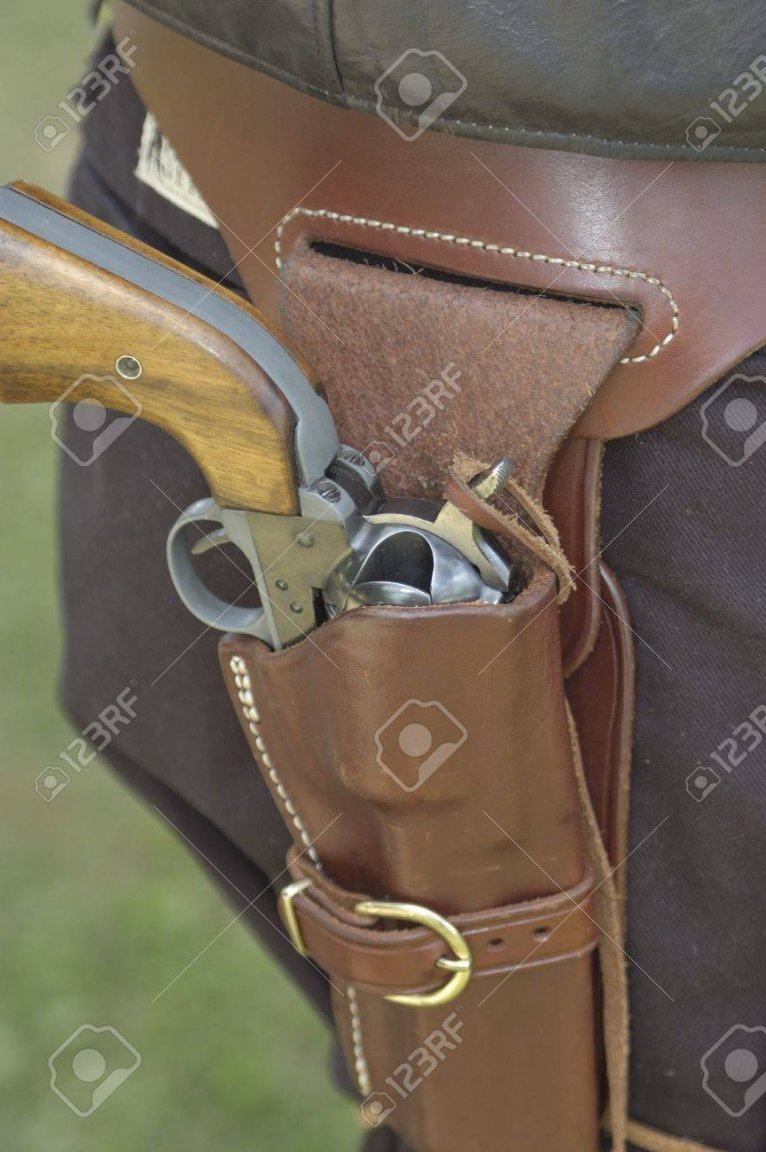 12991393-six-shooter-in-gun-belt-strapped-to-cowboy.thumb.jpg.e6f3f2cf5a671865be61cecf7f5a261f.jpg