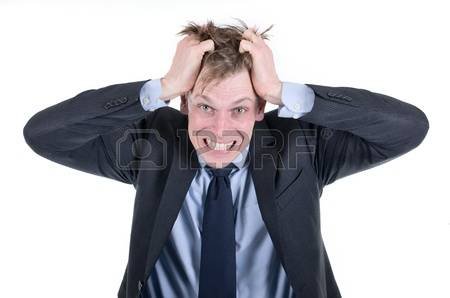 18919888-stressed-businessman-pulling-his-hair.jpg.f1df86efb5627b40a347b2db564a08e2.jpg