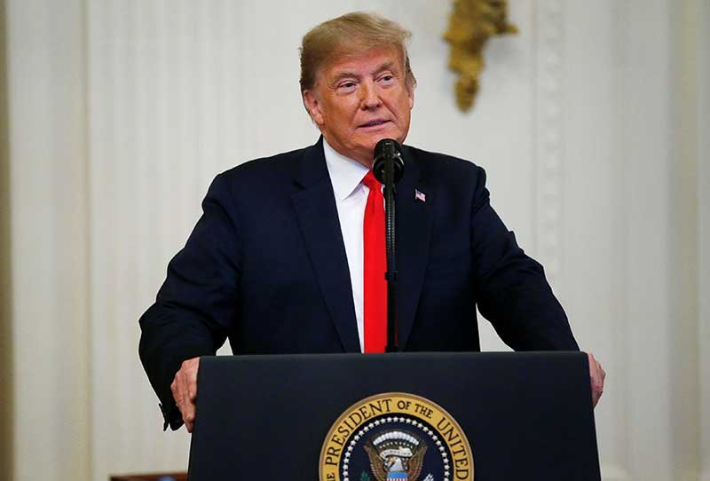 2018-10-01T221022Z_1_LYNXNPEE902RG_RTROPTP_4_TRADE-TRUMP-MEDAL.JPG