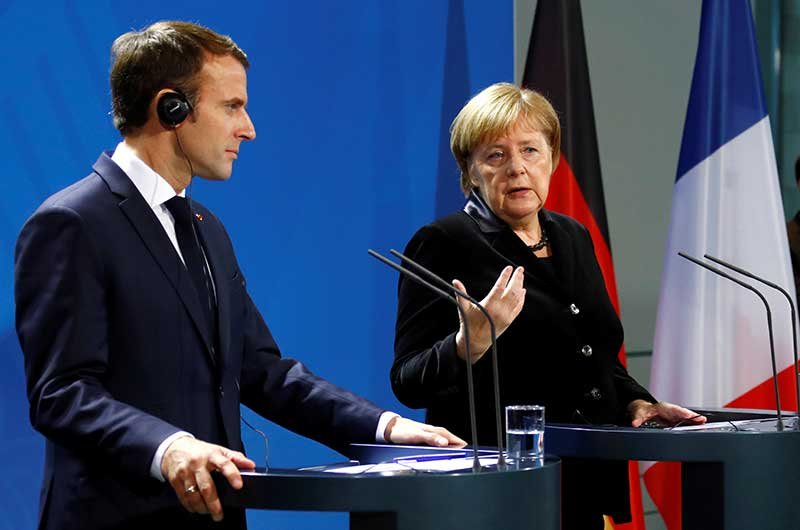 2018-11-18T154708Z_2_LYNXNPEEAH0DQ_RTROPTP_4_GERMANY-FRANCE-MERKEL-MACRON.JPG