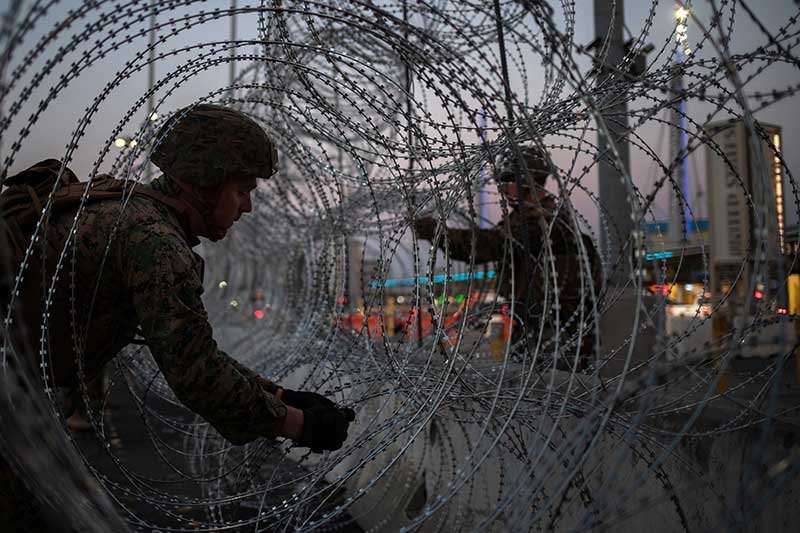 2018-11-20T215435Z_1_LYNXNPEEAJ1HZ_RTROPTP_4_USA-IMMIGRATION-CARAVAN.JPG