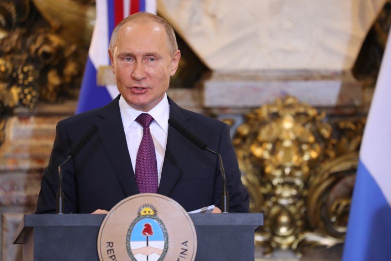2018-12-05T123930Z_2_LYNXMPEEB40R2_RTROPTP_3_ARGENTINA-RUSSIA-MACRI-PUTIN.JPG