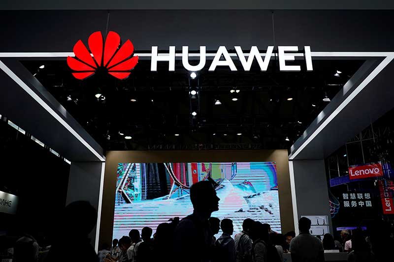 2018-12-06T024956Z_1_LYNXMPEEB506W_RTROPTP_4_BT-GROUP-HUAWEI-TECH.JPG