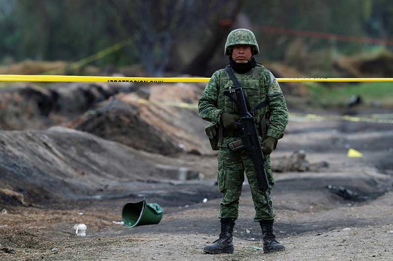 2019-01-20T164224Z_1_LYNXNPEF0J0X2_RTROPTP_4_MEXICO-FUEL-THEFT-BLAST.JPG
