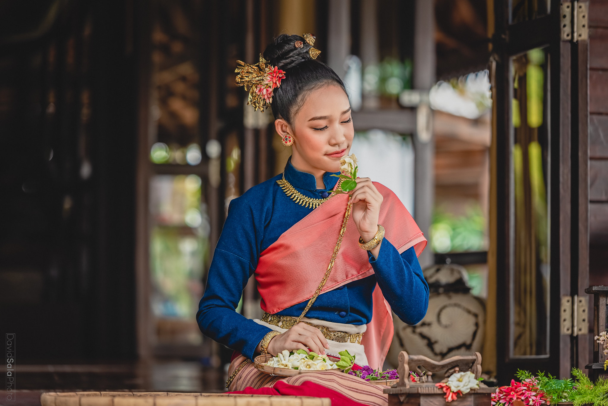 MaliSmellingFlowers (1 of 1).jpg