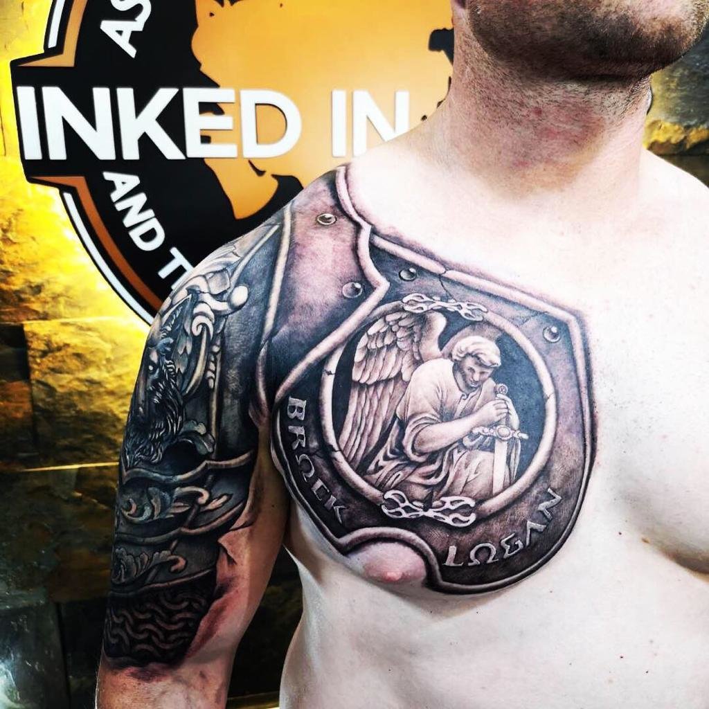 Half Sleeve And Chest Armour Tattoo At Inked In Asia Tattoo Studio Patong Phuket Thailand.jpeg