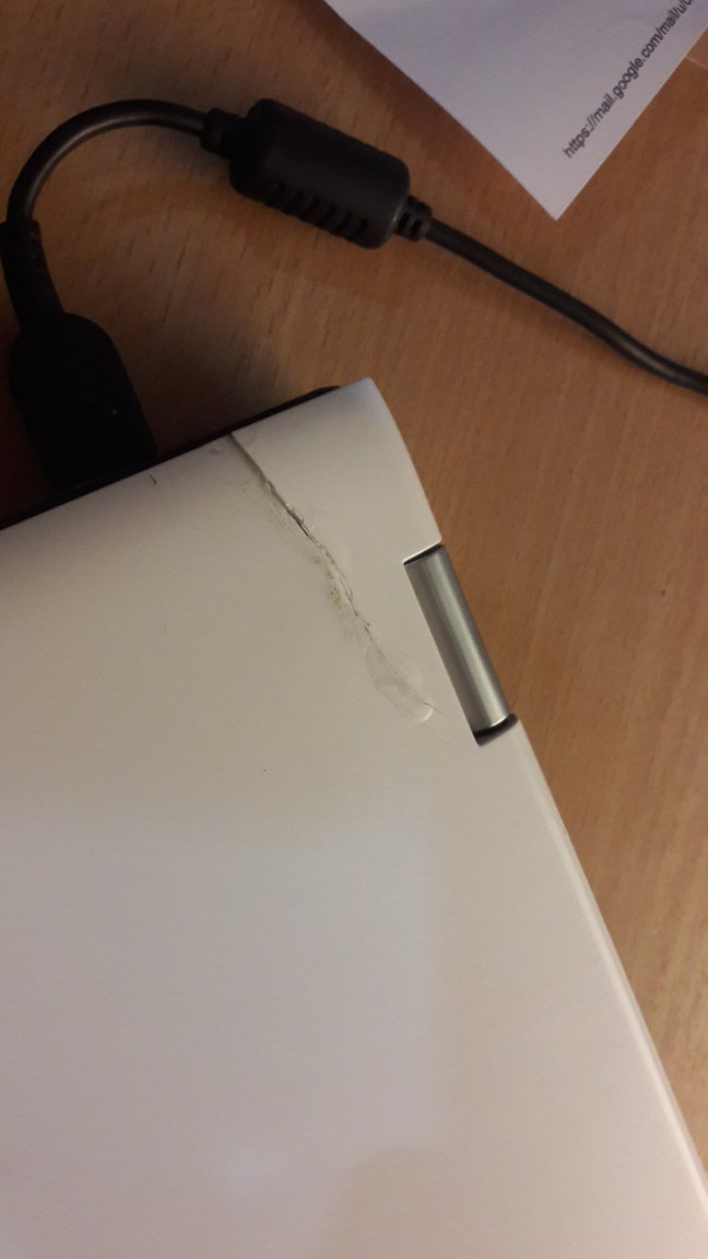 Pic - cracked cover of Lenovo notebook 26 September 2019.jpg