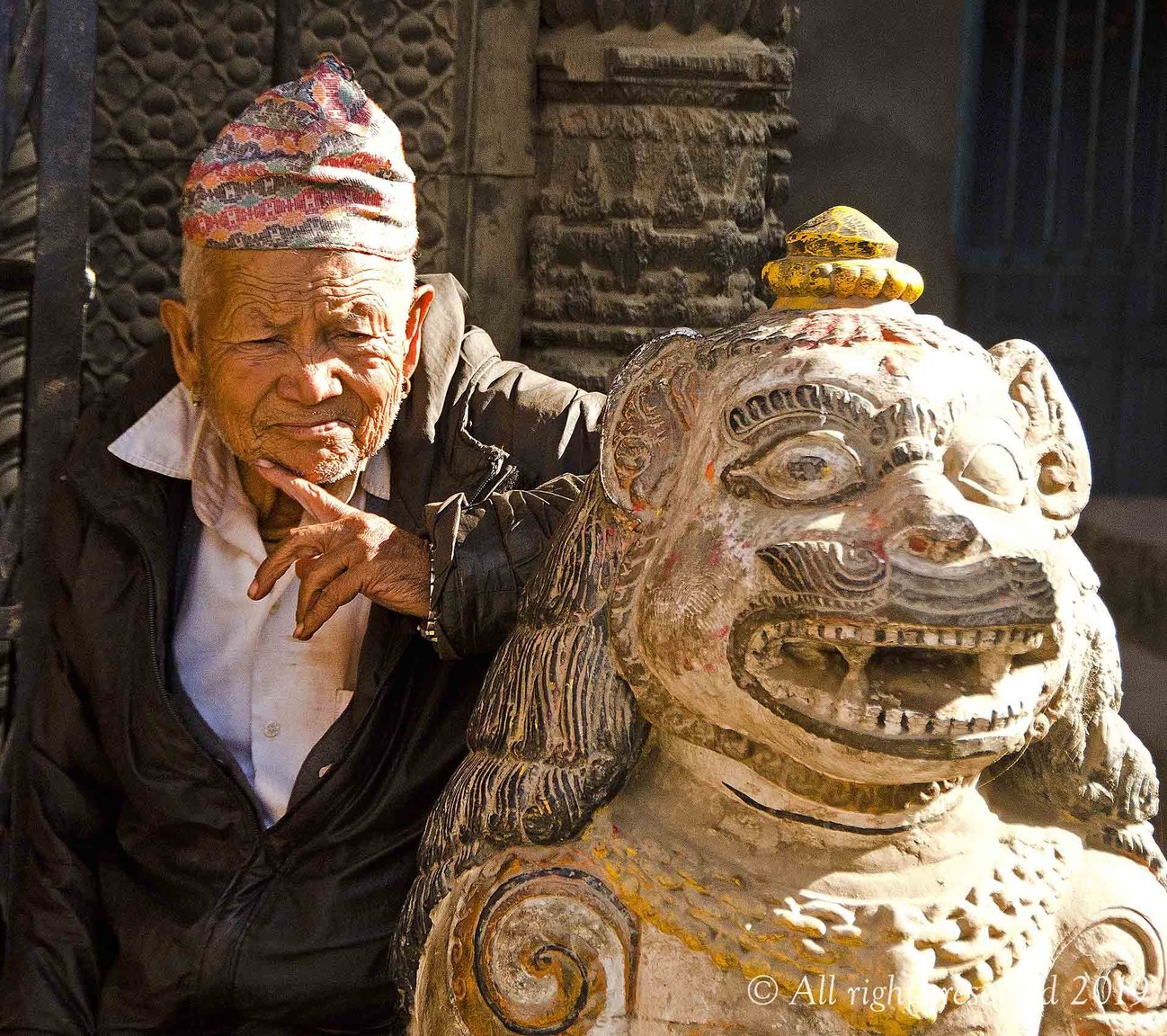 Old man with statue.jpg