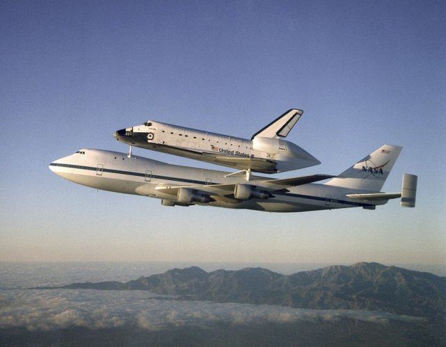 1280px-Atlantis_on_Shuttle_Carrier_Aircraft.jpg.ad5ace0cd83aec21db210d654b567d69.jpg