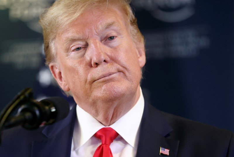 2020-01-22T231541Z_1_LYNXMPEG0L2GF_RTROPTP_3_USA-TRUMP-IMPEACHMENT-POLL.JPG