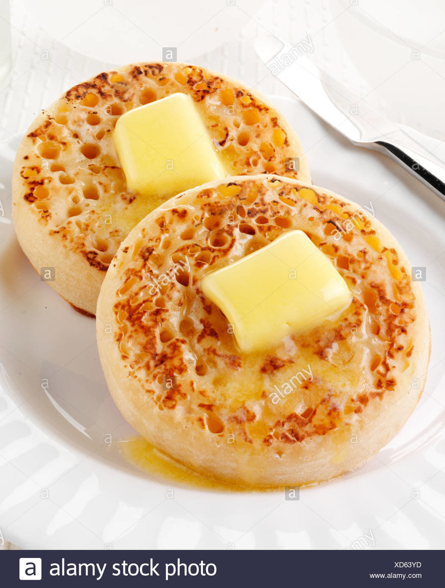 english-crumpets-with-butter-XD63YD.jpg