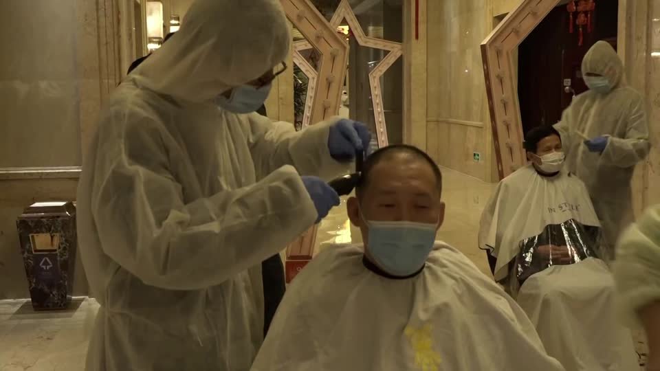 2020-02-13T122900Z_1_LOP000LSH26G0_RTRMADP_BASEIMAGE-960X540_CHINA-HEALTH-HAIR-CUTTING-ROUGH-CUT.JPG