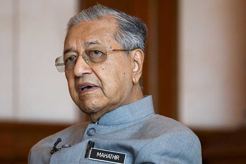 2020-02-24T025519Z_1_LYNXNPEG1N07B_RTROPTP_4_MALAYSIA-POLITICS-MAHATHIR.JPG