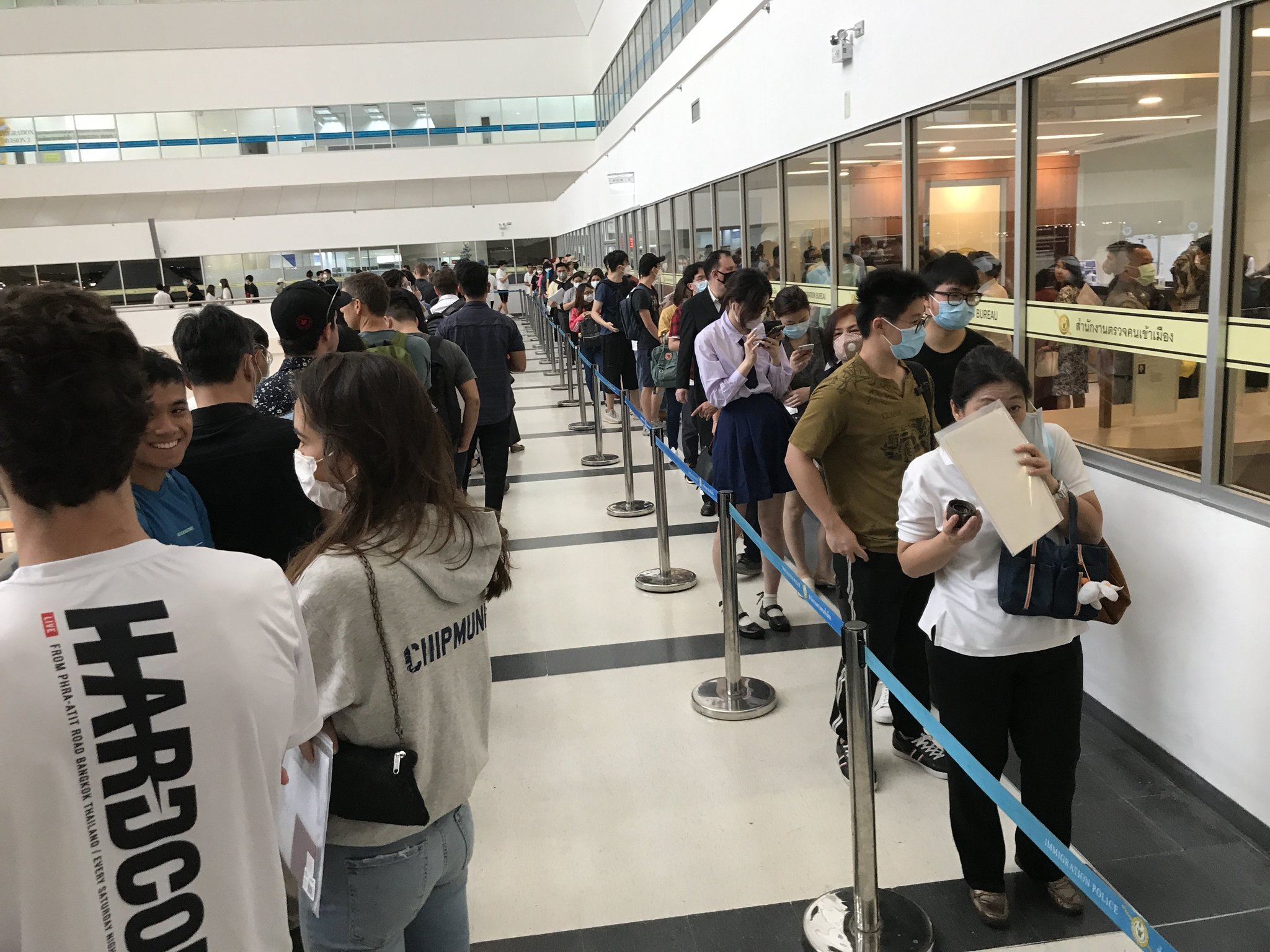 2. 8.30am queue snaking towards main door.JPG