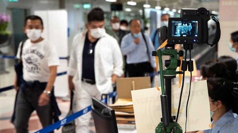 a-thermographic-device-displays-the-temperature-of-arriving-passengers-before-they-enter-immigrations-at-bangkok-s-suvarnabhumi-international-airport-2.jpg