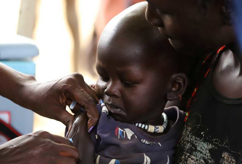 2020-04-13T233712Z_2_LYNXNPEG3C1M4_RTROPTP_4_HEALTH-CORONAVIRUS-MEASLES.JPG