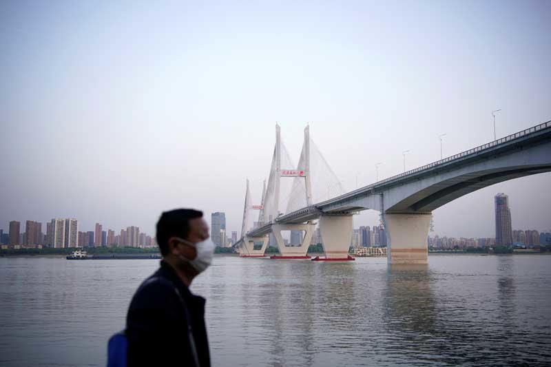 2020-04-16T005418Z_1_LYNXNPEG3F02R_RTROPTP_4_HEALTH-CORONAVIRUS-CHINA-WUHAN.JPG