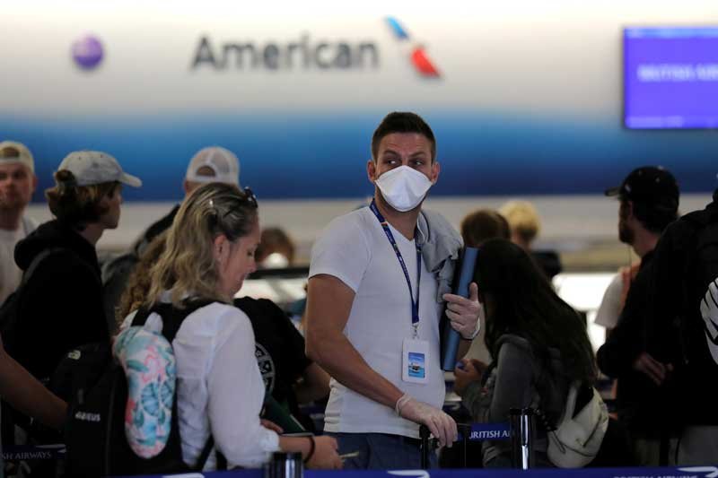 2020-05-12T213728Z_1_LYNXMPEG4B207_RTROPTP_4_HEALTH-CORONAVIRUS-AIRLINES-MASKS.JPG