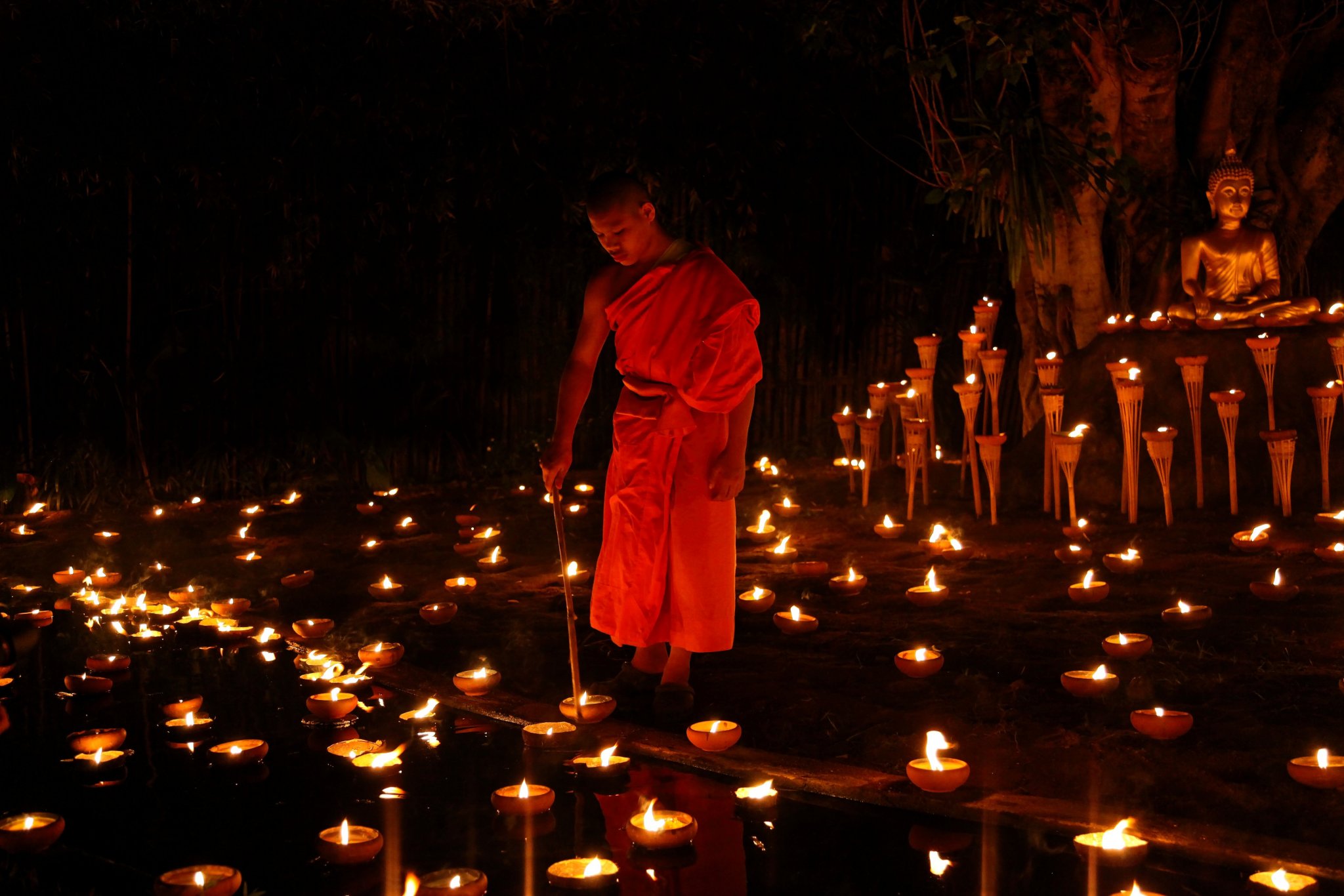 Monk LIghting Candles.jpg