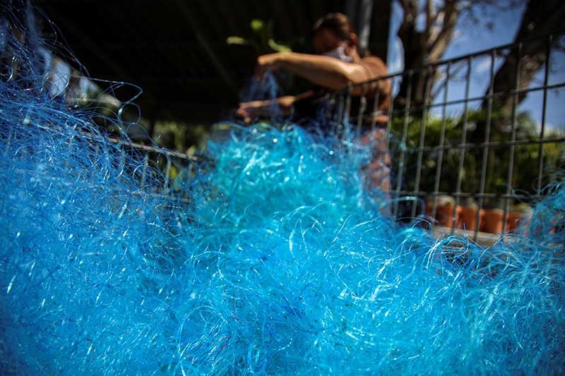 2020-07-02T120909Z_2_LYNXMPEG610W9_RTROPTP_4_HEALTH-CORONAVIRUS-THAILAND-FISHING-NETS.JPG
