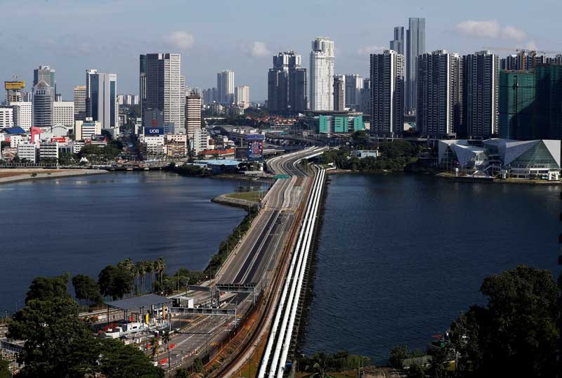2020-07-14T050131Z_1_LYNXNPEG6D06W_RTROPTP_4_SINGAPORE-MALAYSIA-TRAVEL.JPG
