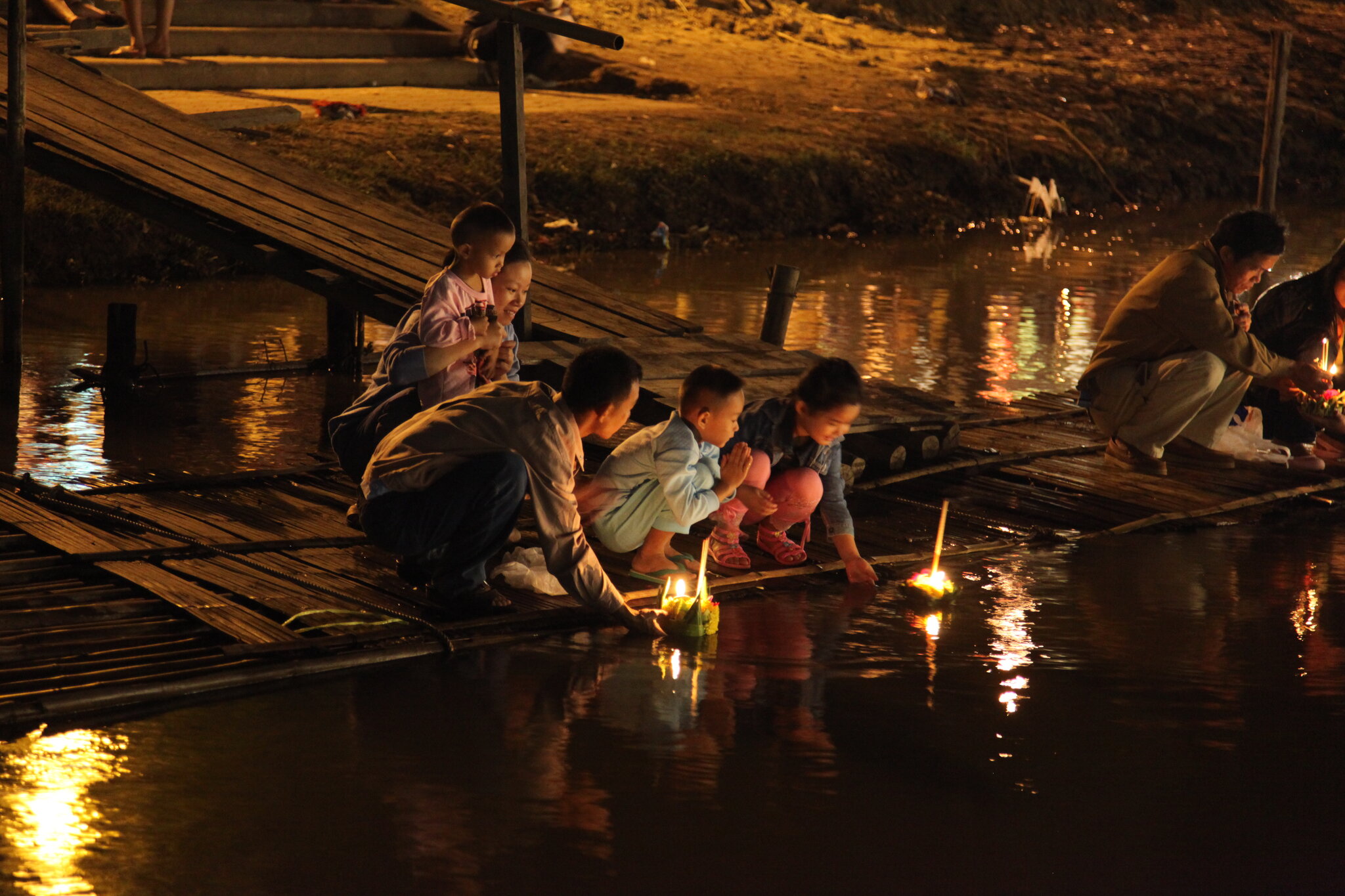 Thai Family Celebrating Loy Krathong.jpg
