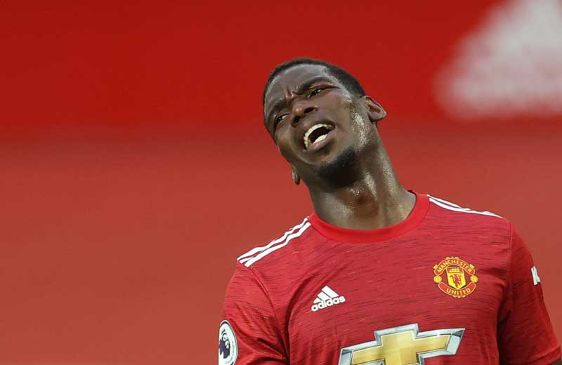2020-11-09T193339Z_1_LYNXMPEGA81OV_RTROPTP_4_SOCCER-ENGLAND-MUN-POGBA.JPG