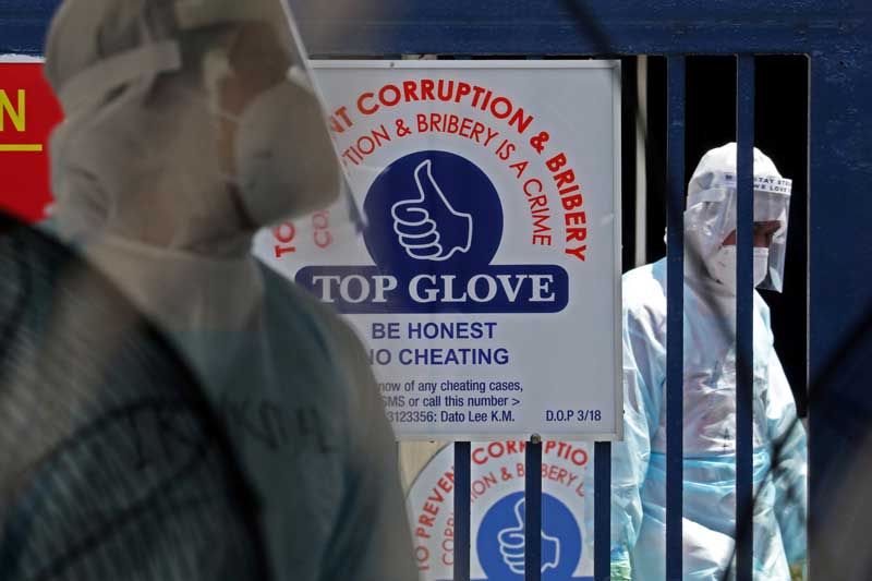 2020-11-24T063910Z_1_LYNXMPEGAN09V_RTROPTP_4_HEALTH-CORONAVIRUS-TOP-GLOVE.JPG