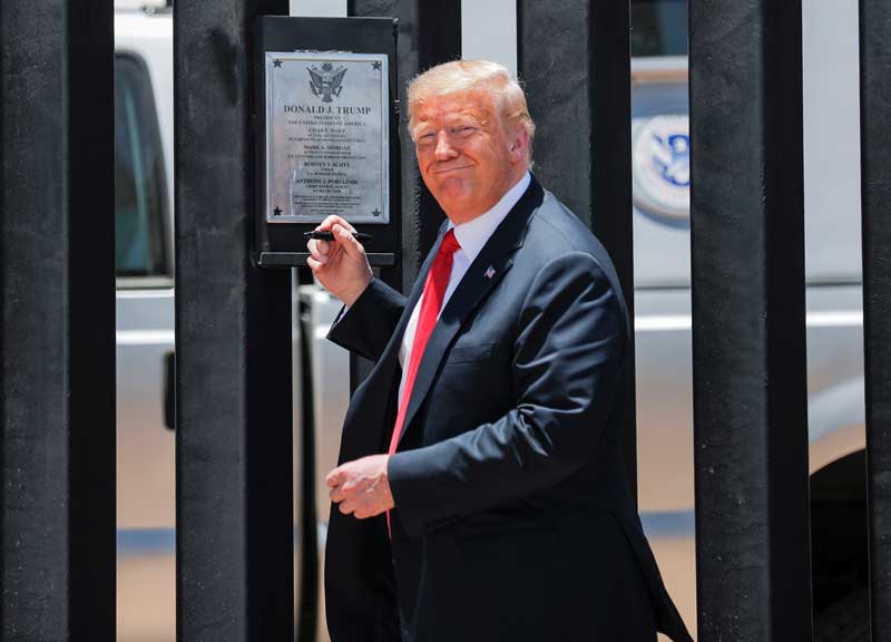 2020-12-03T111615Z_1_LYNXMPEGB20SA_RTROPTP_4_USA-IMMIGRATION-TRUMP.JPG