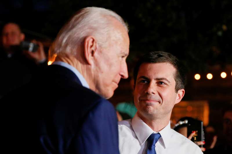 2020-12-16T111618Z_1_LYNXMPEGBF0QI_RTROPTP_4_USA-BIDEN-BUTTIGIEG.JPG