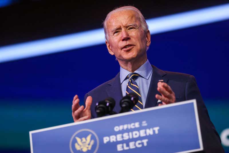 2020-12-28T212419Z_1_LYNXMPEGBR0Y8_RTROPTP_4_USA-BIDEN.JPG