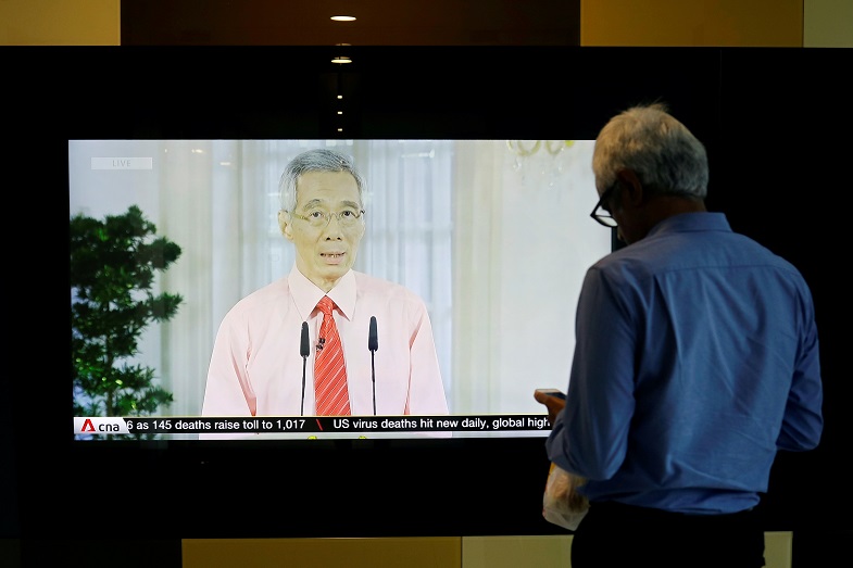2020-12-31T102720Z_2_LYNXMPEGBU0F9_RTROPTP_4_SINGAPORE-ECONOMY-PM.JPG