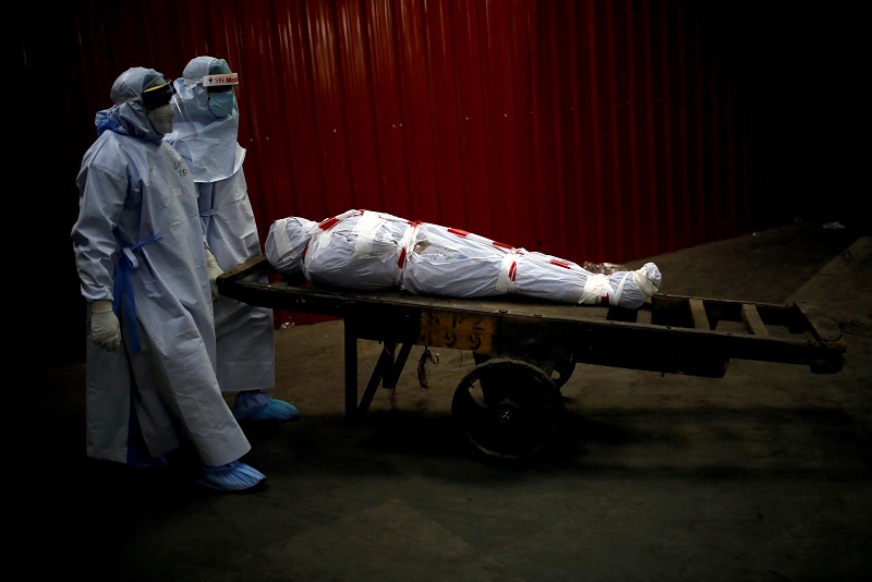 2021-01-15T183418Z_1_LYNXMPEH0E1EB_RTROPTP_4_HEALTH-CORONAVIRUS-GLOBAL-CASUALTIES.JPG