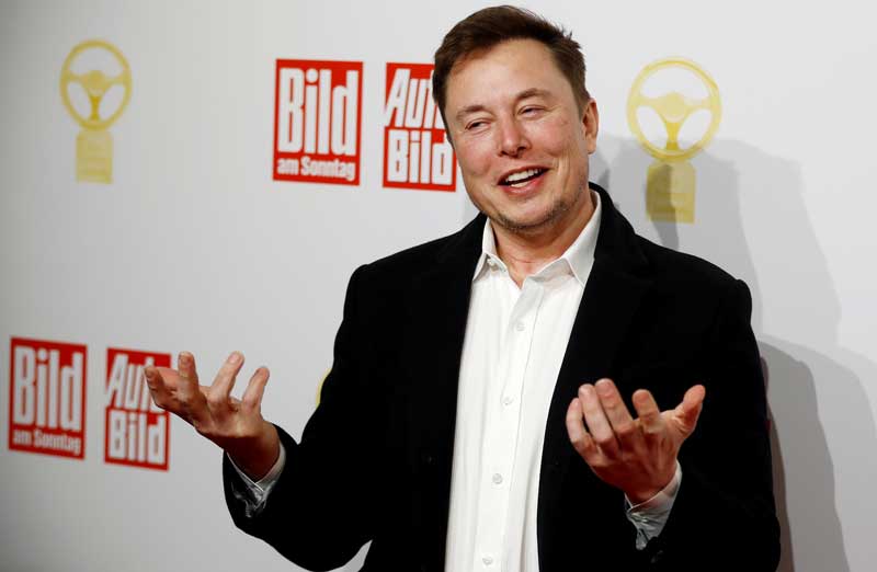 2021-02-08T170032Z_1_LYNXMPEH171AL_RTROPTP_4_CRYPTO-CURRENCY-TESLA.JPG