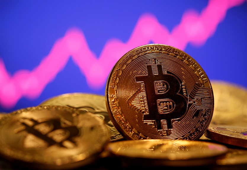 2021-02-09T081527Z_1_LYNXMPEH180IC_RTROPTP_4_CRYPTO-CURRENCY-TESLA-EXPLAINER.JPG
