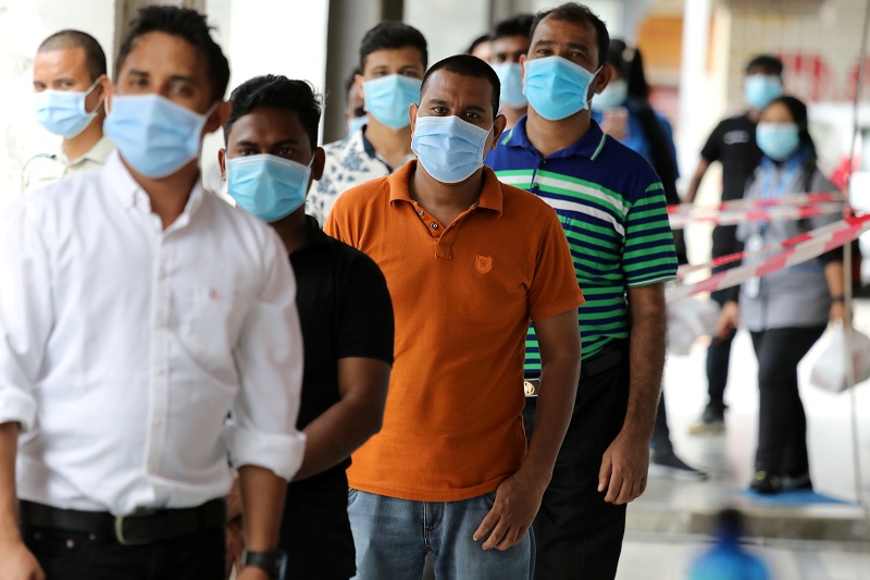 2021-02-11T050514Z_1_LYNXMPEH1A09T_RTROPTP_4_HEALTH-CORONAVIRUS-MALAYSIA-VACCINES.JPG