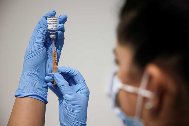 2021-02-19T001324Z_2_LYNXMPEH1I009_RTROPTP_4_HEALTH-CORONAVIRUS-VACCINES-STOCKPILING.JPG