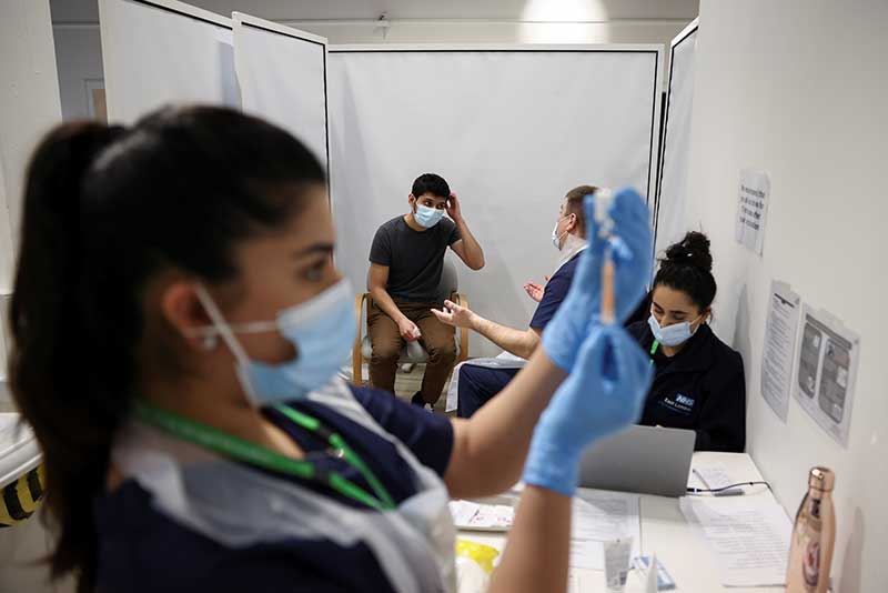 2021-02-20T230530Z_1_LYNXMPEH1J0HO_RTROPTP_4_HEALTH-CORONAVIRUS-BRITAIN-VACCINE.JPG