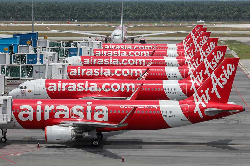 2021-02-22T092306Z_1_LYNXMPEH1L0CL_RTROPTP_4_AIRASIA-GROUP-RESULTS.JPG