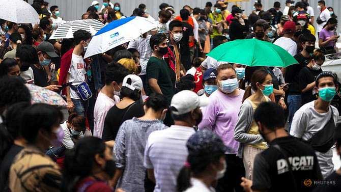 file-photo--local-residents-queue-for-a-covid-19-nasal-swab-test-in-bangkok-1.jpg