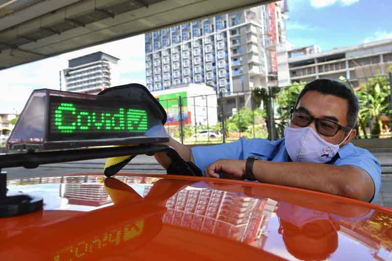 2021-06-07T011423Z_1_LYNXNPEH5602F_RTROPTP_4_HEALTH-CORONAVIRUS-THAILAND-TAXI.JPG