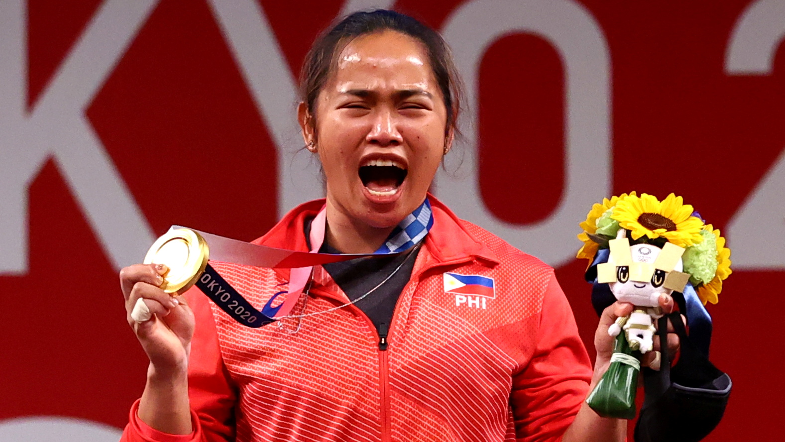 2021-07-26T162245Z_1_LYNXMPEH6P16W_RTROPTP_4_OLYMPICS-2020-WLF-W-55KG-MEDAL.JPG.fcaf29041dd5b285f7842ba9bdea9154.JPG