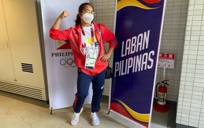 hidilyn-diaz-from-her-fb-page.png.5e52139982010fbda1ae8fa91f06d6a1.png